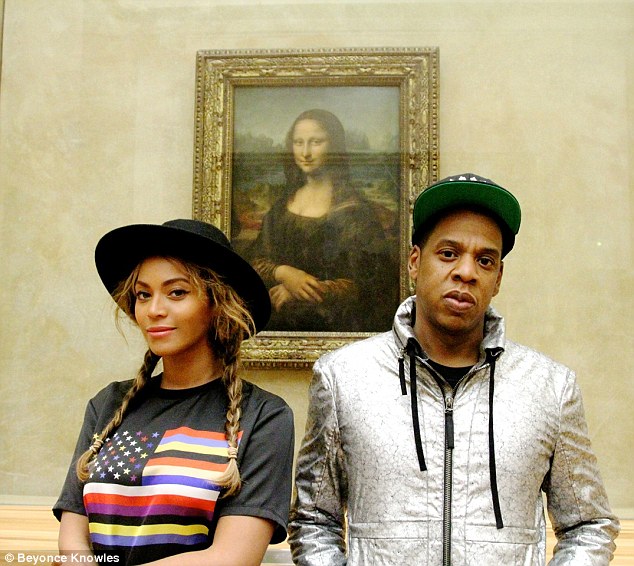 1413128016021_wps_52_Beyonc_Knowles_and_Jay_Z_
